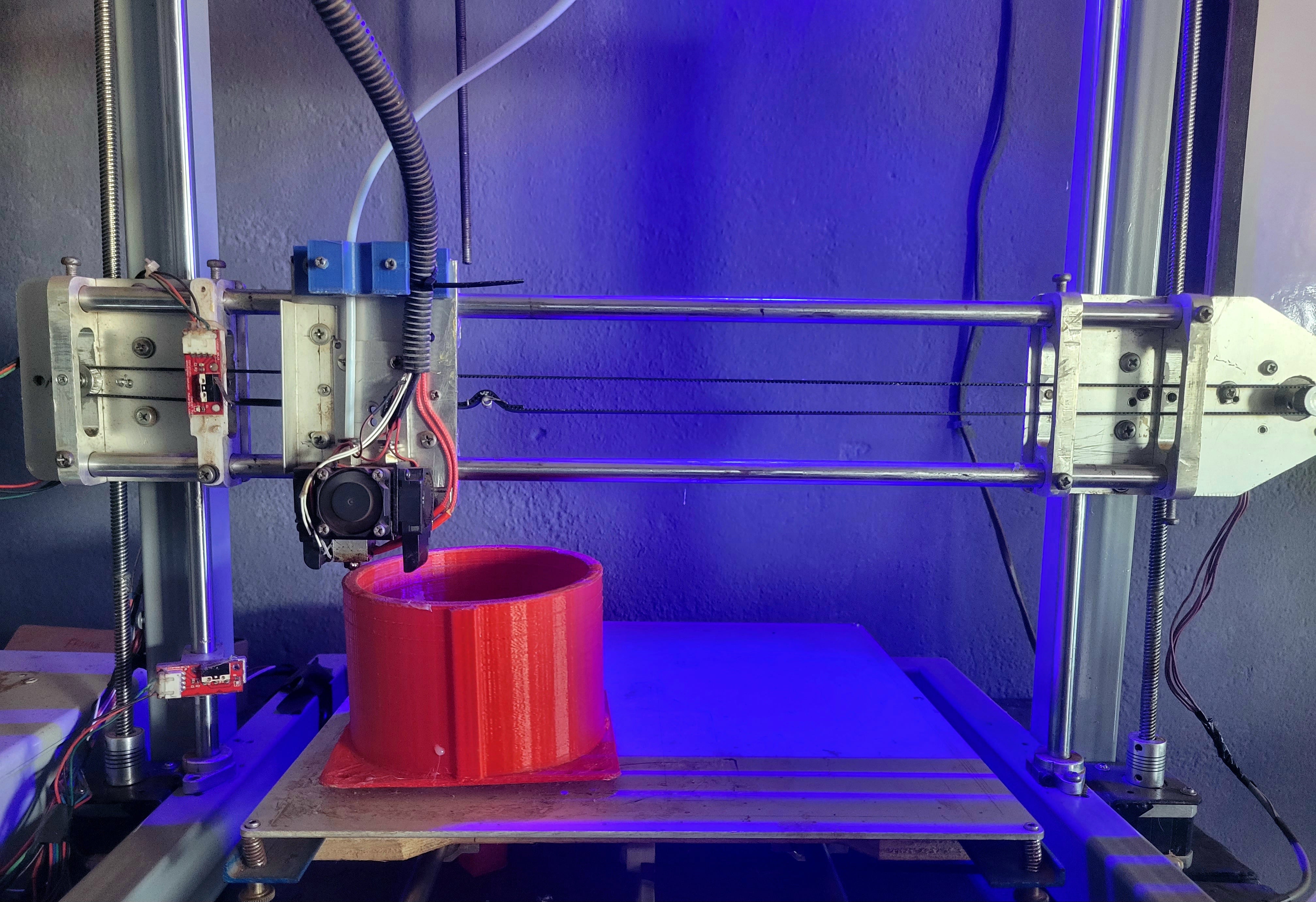 A 3D print in progress on a NestX printer in Bamenda